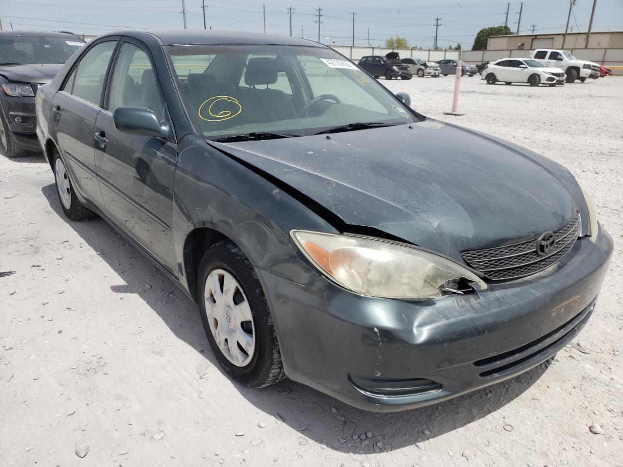 TOYOTA CAMRY LE 2003 with VIN 4T1BE32K63U651510 - Photo from auction