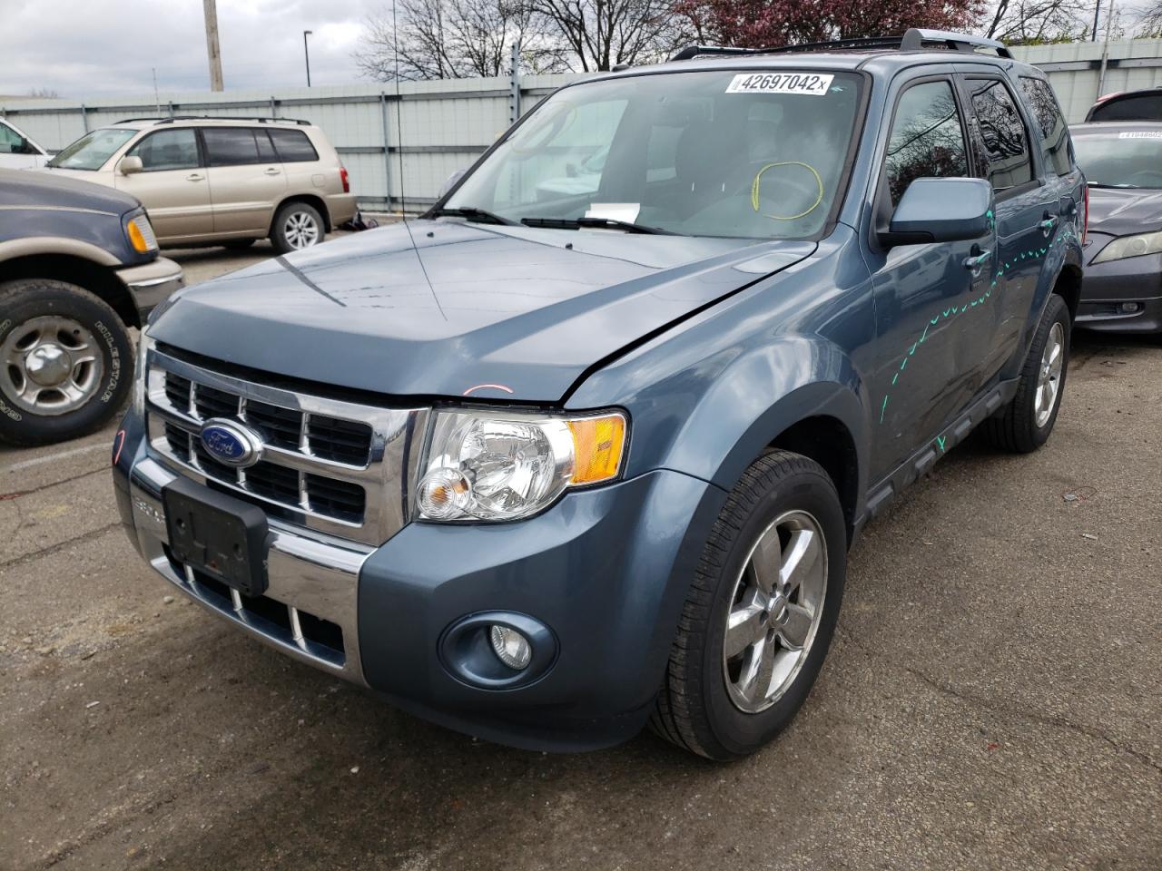 Photo 2 from auction – 2011 FORD ESCAPE LIM with VIN 1FMCU9EG8BKC29038