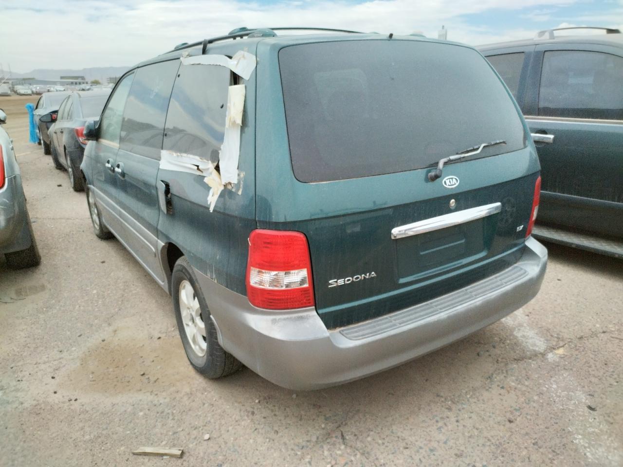 Photo 3 from auction – 2004 KIA SEDONA EX with VIN KNDUP131546595390