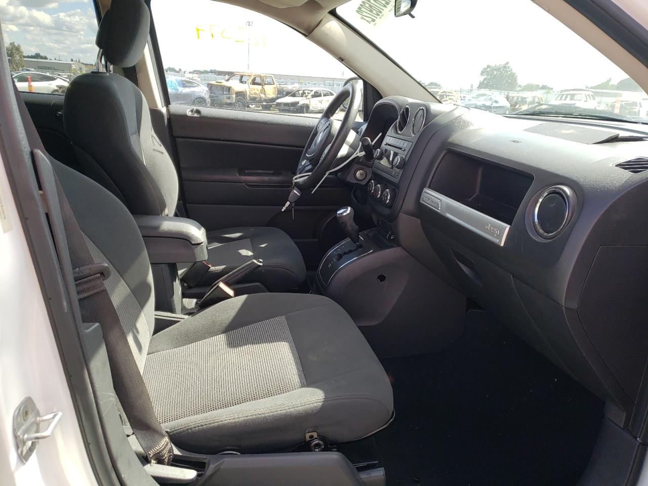 Photo 5 from auction – 2011 JEEP COMPASS SP with VIN 1J4NF1FB1BD234799
