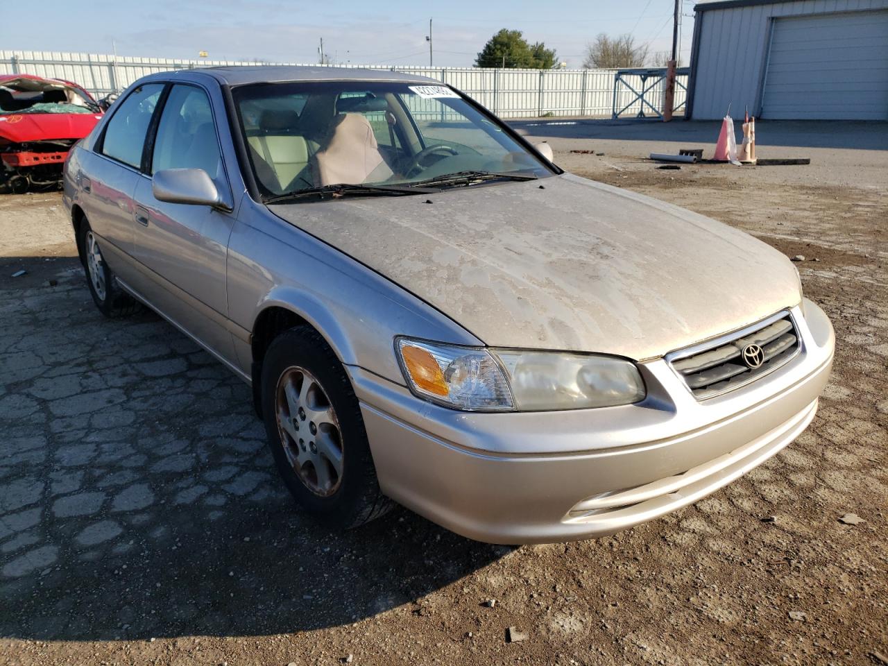 TOYOTA CAMRY CE 2000 with VIN 4T1BG28K7YU737427 - Photo from auction