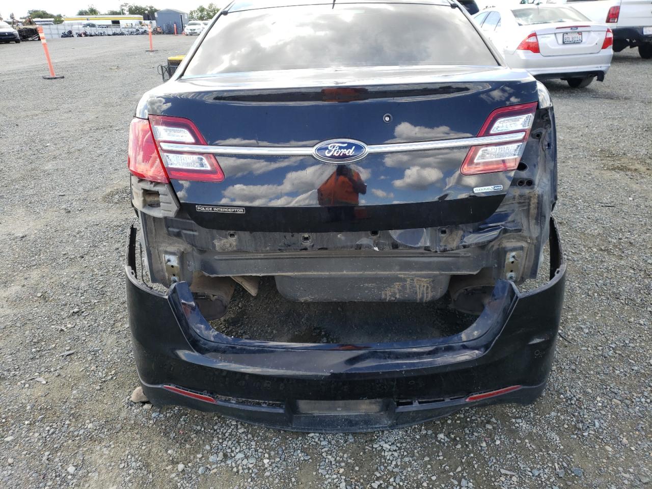 Photo 9 from auction – 2015 FORD TAURUS POL with VIN 1FAHP2MK9FG162270