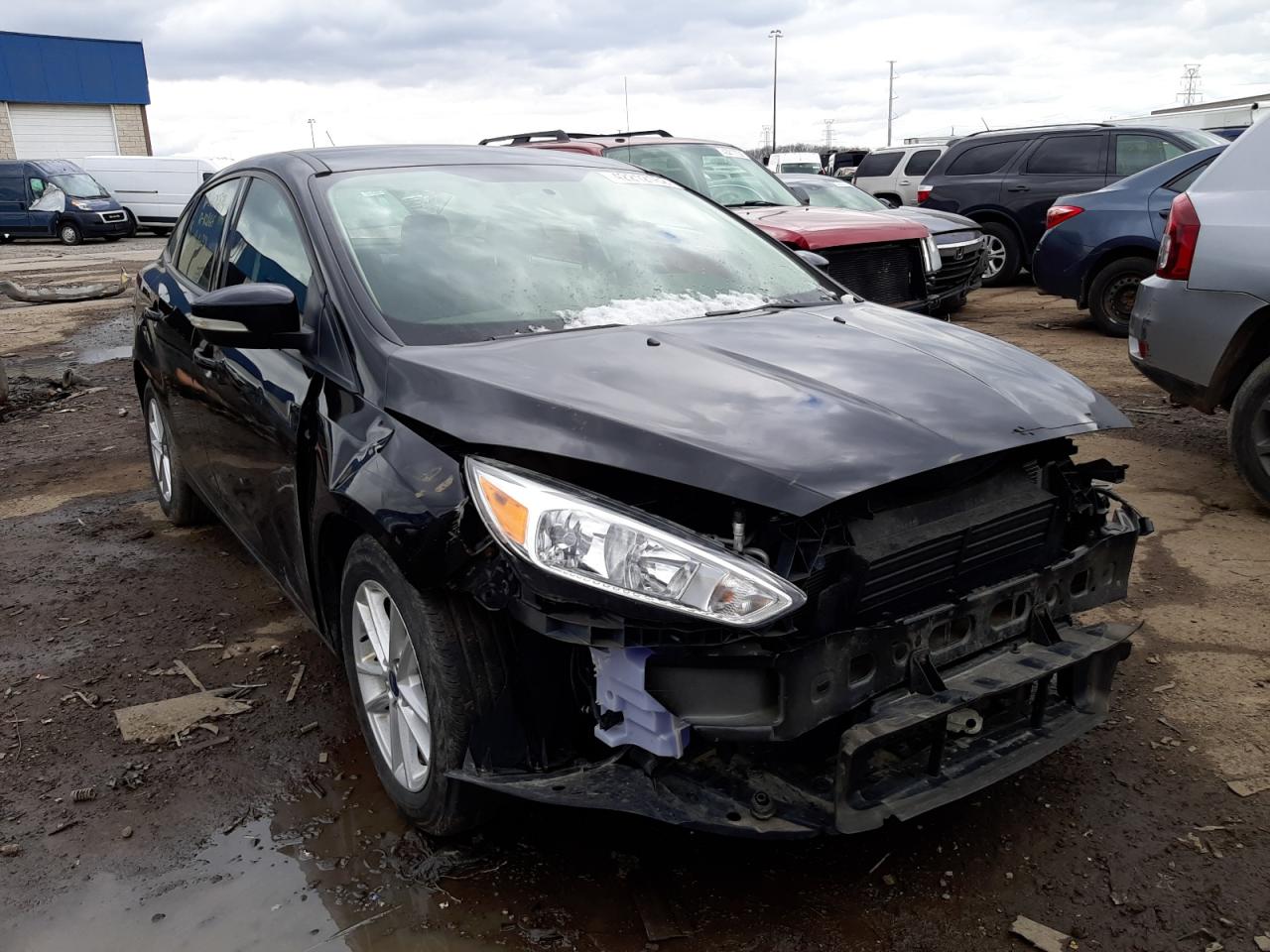 FORD FOCUS SE 2017 with VIN 1FADP3F29HL209874 - Photo from auction