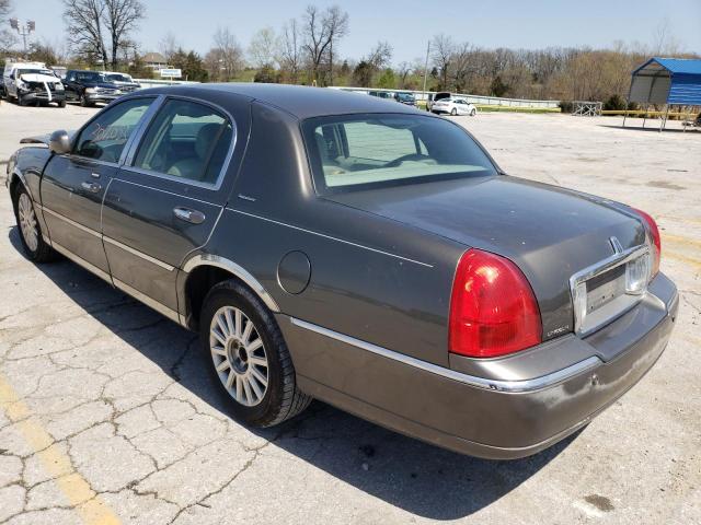 Photo 3 from auction – 2004 LINCOLN TOWN CAR E with VIN 1LNHM81W74Y676425