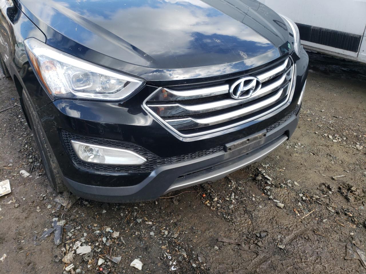 Photo 9 from auction – 2016 HYUNDAI SANTA FE S with VIN 5XYZU3LB5GG366809