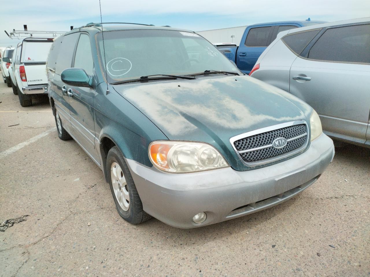 KIA SEDONA EX 2004 with VIN KNDUP131546595390 - Photo from auction