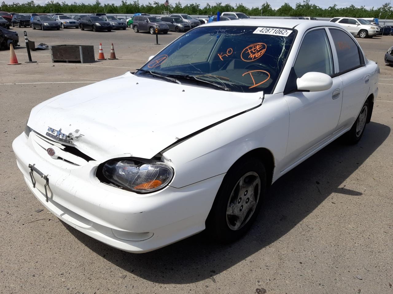 Photo 2 from auction – 2000 KIA SEPHIA BAS with VIN KNAFB1211Y5902507