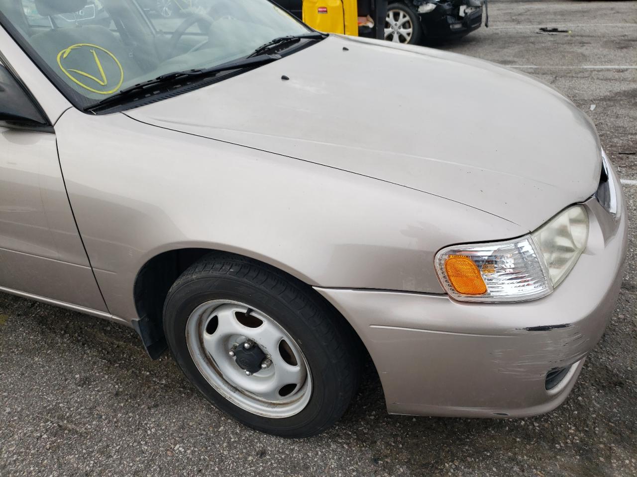 Photo 9 from auction – 2002 TOYOTA COROLLA CE with VIN 2T1BR12E72C560250