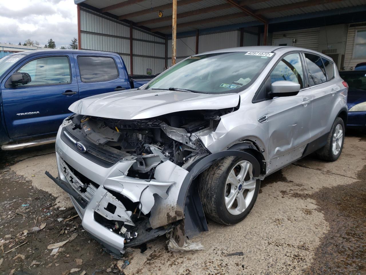 Photo 2 from auction – 2016 FORD ESCAPE SE with VIN 1FMCU0G78GUB64325