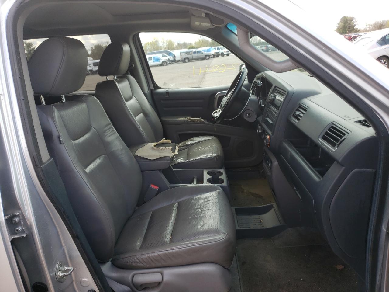 Photo 5 from auction – 2012 HONDA RIDGELINE with VIN 5FPYK1F53CB454391