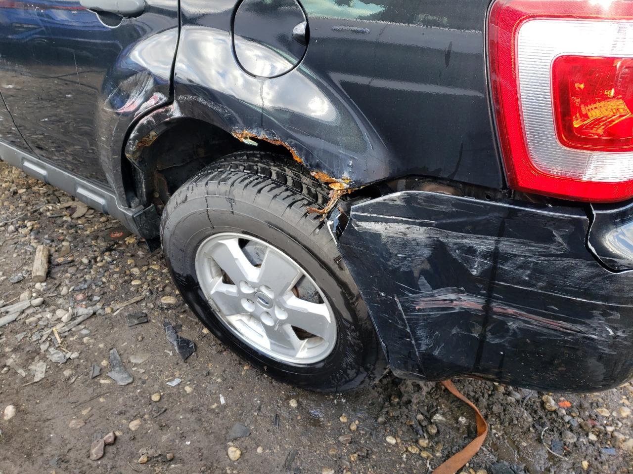 Photo 9 from auction – 2011 FORD ESCAPE XLT with VIN 1FMCU0D7XBKB02479