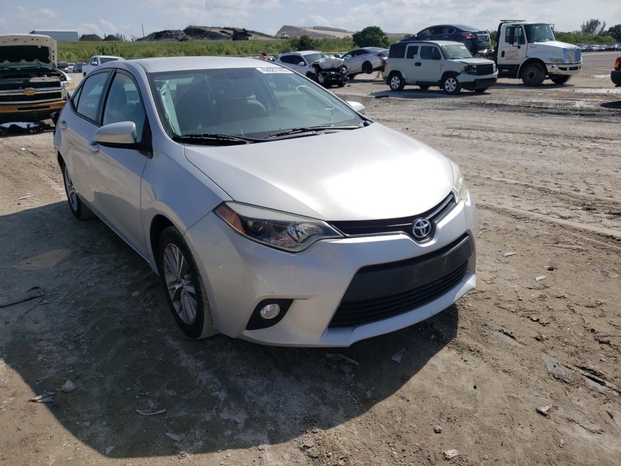 TOYOTA COROLLA L 2014 with VIN 5YFBURHE4EP128658 - Photo from auction