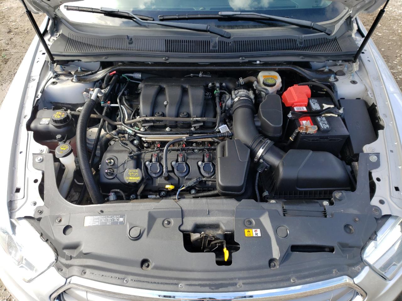 Photo 7 from auction – 2013 FORD TAURUS SEL with VIN 1FAHP2H89DG205758