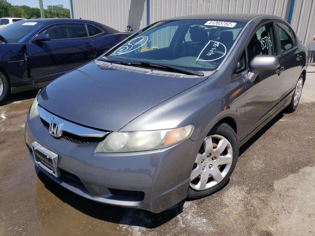 Photo 2 from auction – 2011 HONDA CIVIC LX with VIN 19XFA1F58BE002167