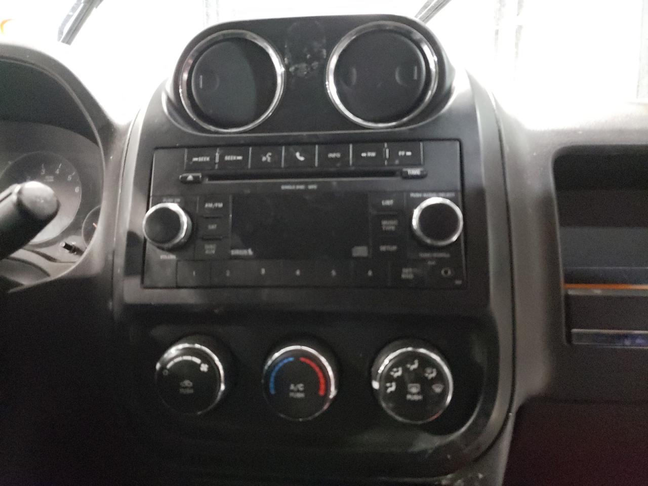 Photo 9 from auction – 2010 JEEP COMPASS SP with VIN 1J4NT1FA6AD640964