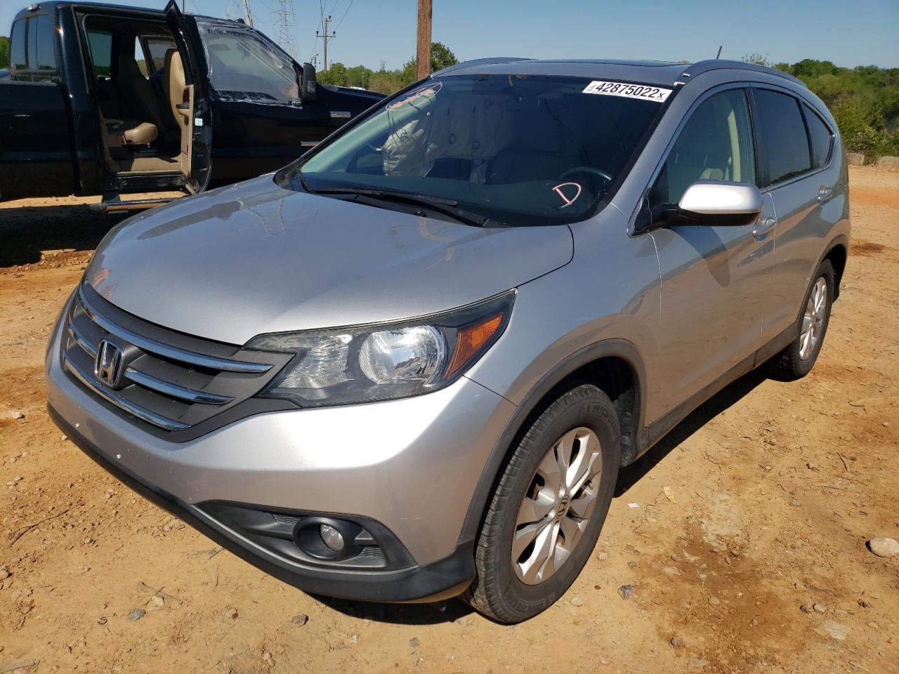 Photo 2 from auction – 2012 HONDA CR-V EXL with VIN JHLRM3H78CC006116