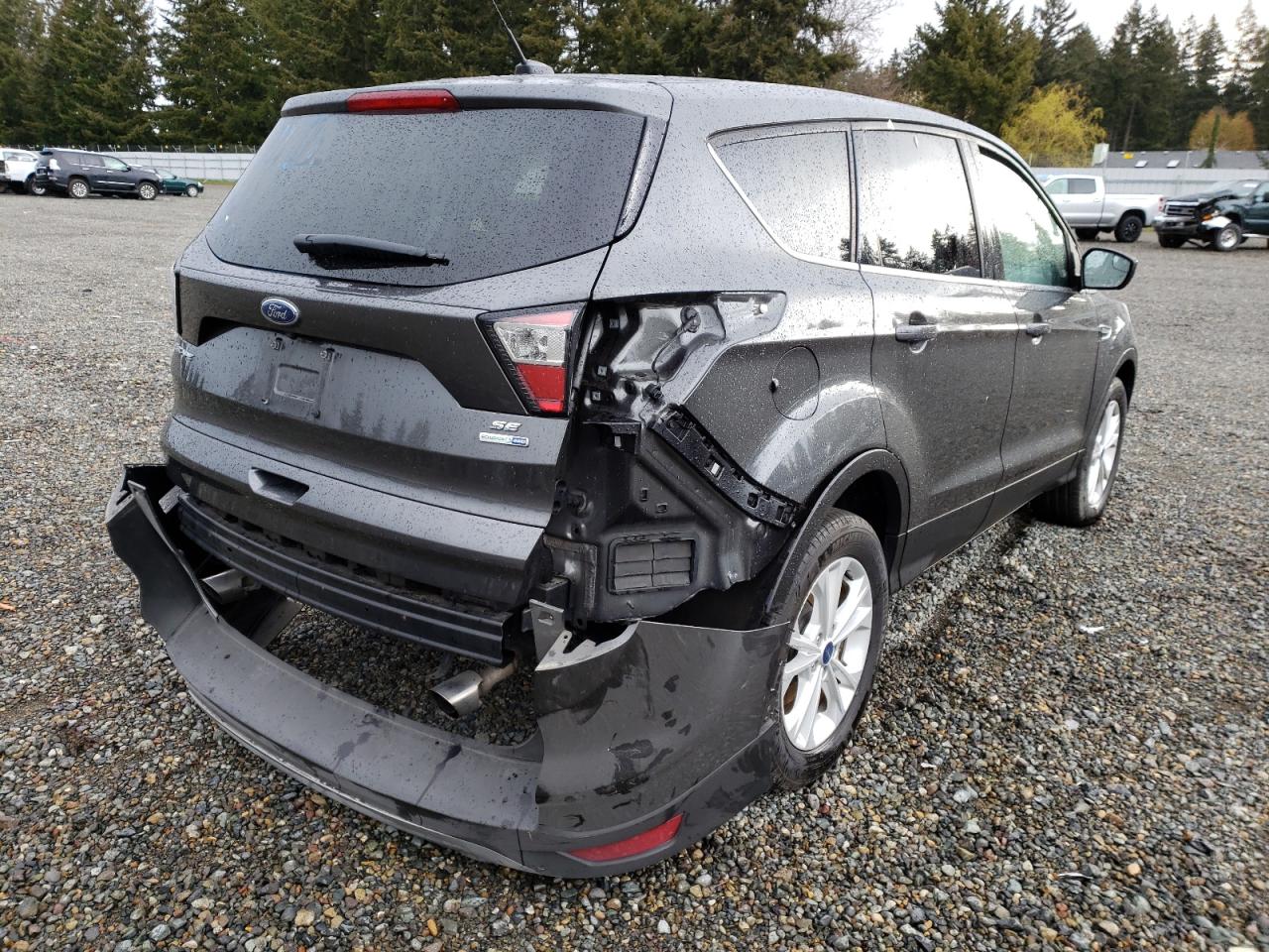 Photo 4 from auction – 2017 FORD ESCAPE SE with VIN 1FMCU9GD0HUE57812