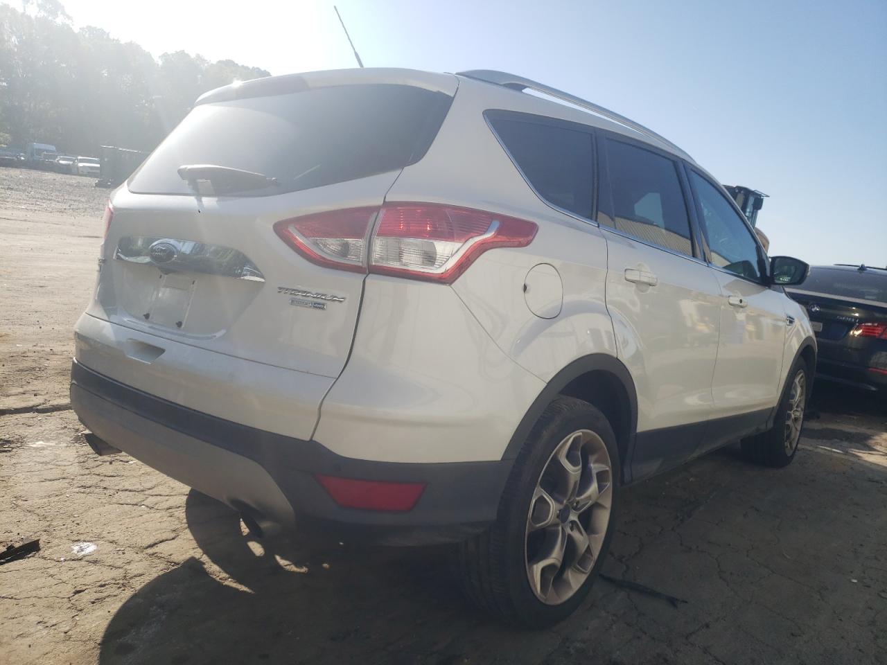 Photo 4 from auction – 2015 FORD ESCAPE TIT with VIN 1FMCU9J94FUA66793