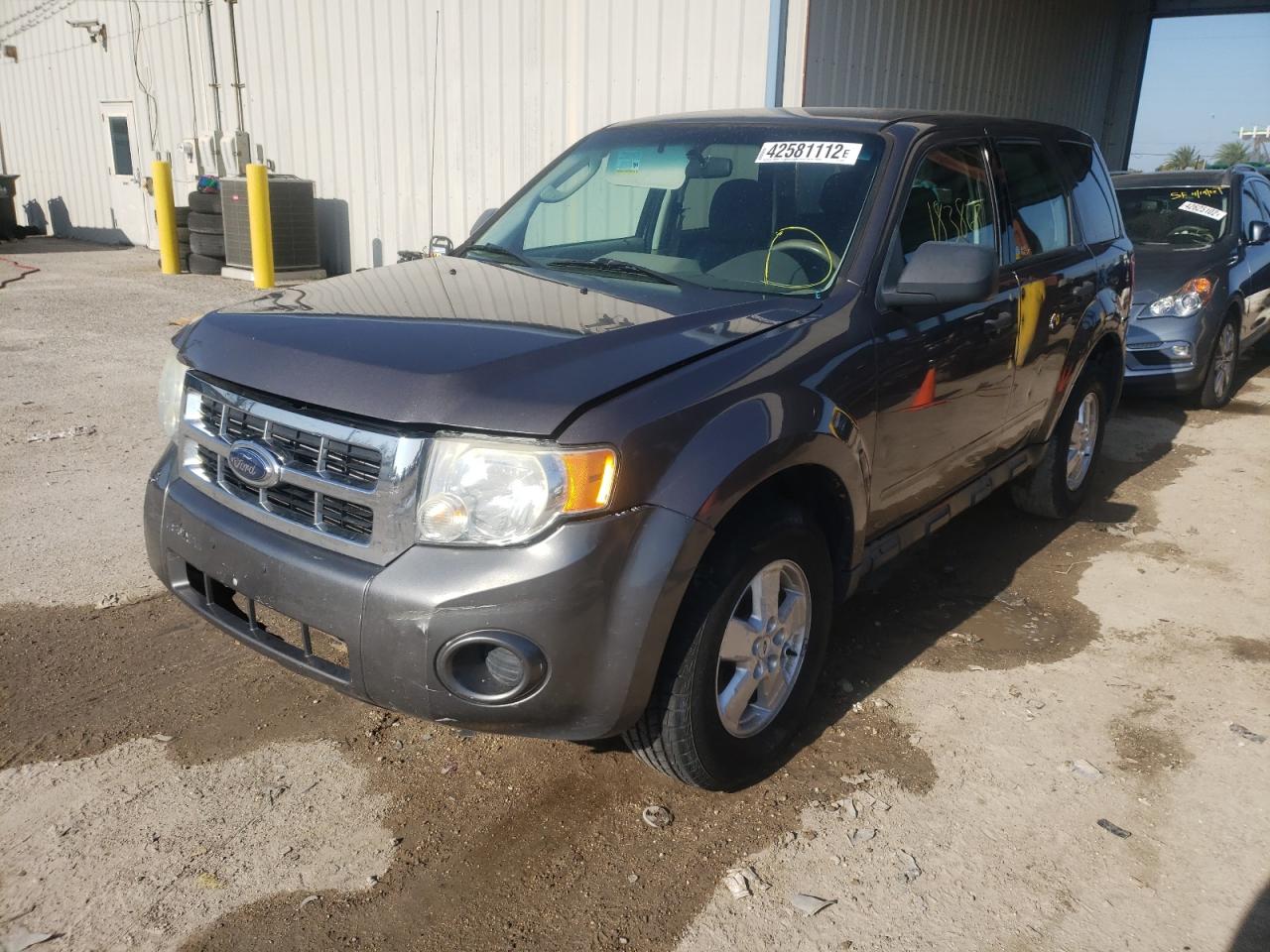 Photo 2 from auction – 2010 FORD ESCAPE XLS with VIN 1FMCU0C78AKA54464