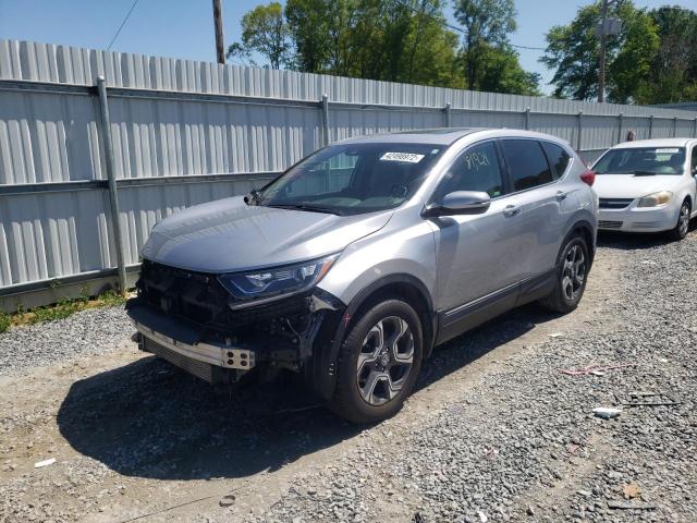 Photo 2 from auction – 2018 HONDA CR-V EX with VIN 7FARW1H52JE004098