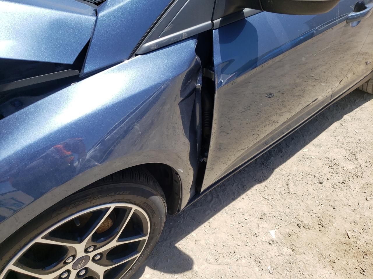 Photo 10 from auction – 2018 FORD FOCUS SEL with VIN 1FADP3H23JL215236