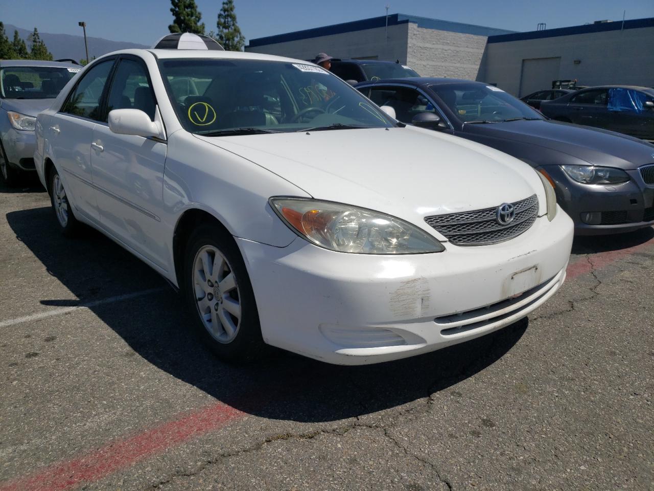 Photo 1 from auction – 2002 TOYOTA CAMRY LE with VIN 4T1BF30K92U503012