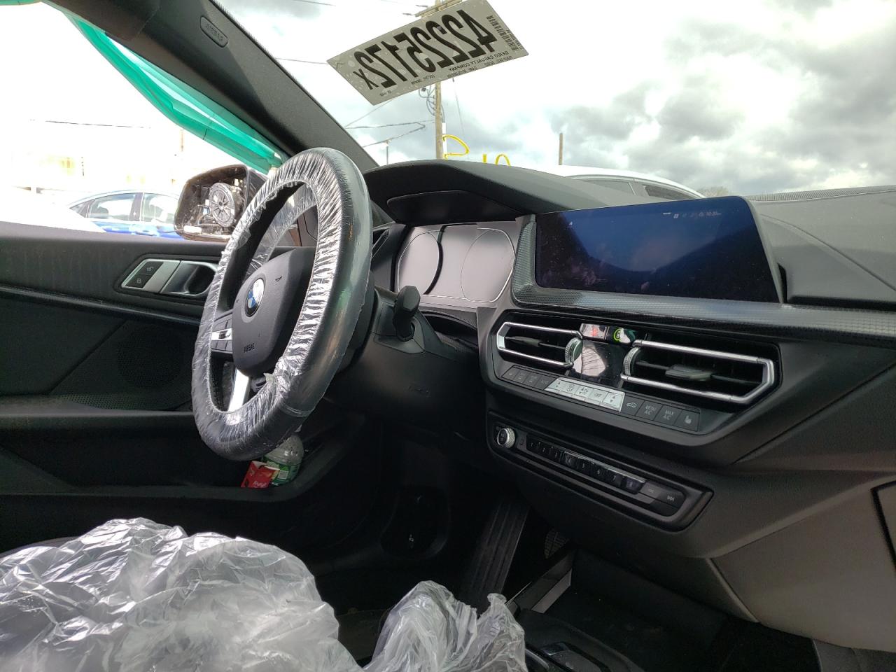 Photo 9 from auction – 2021 BMW 228XI with VIN WBA73AK04M7G44459