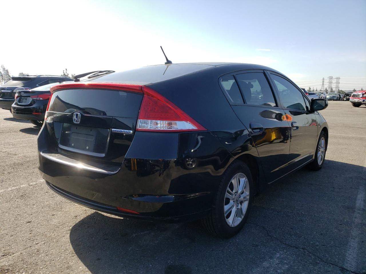 Photo 4 from auction – 2010 HONDA INSIGHT EX with VIN JHMZE2H78AS006932
