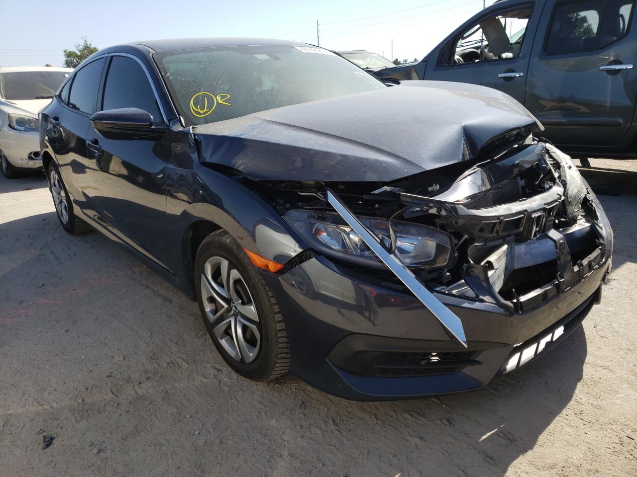 HONDA CIVIC LX 2017 with VIN 19XFC2F58HE078593 - Photo from auction