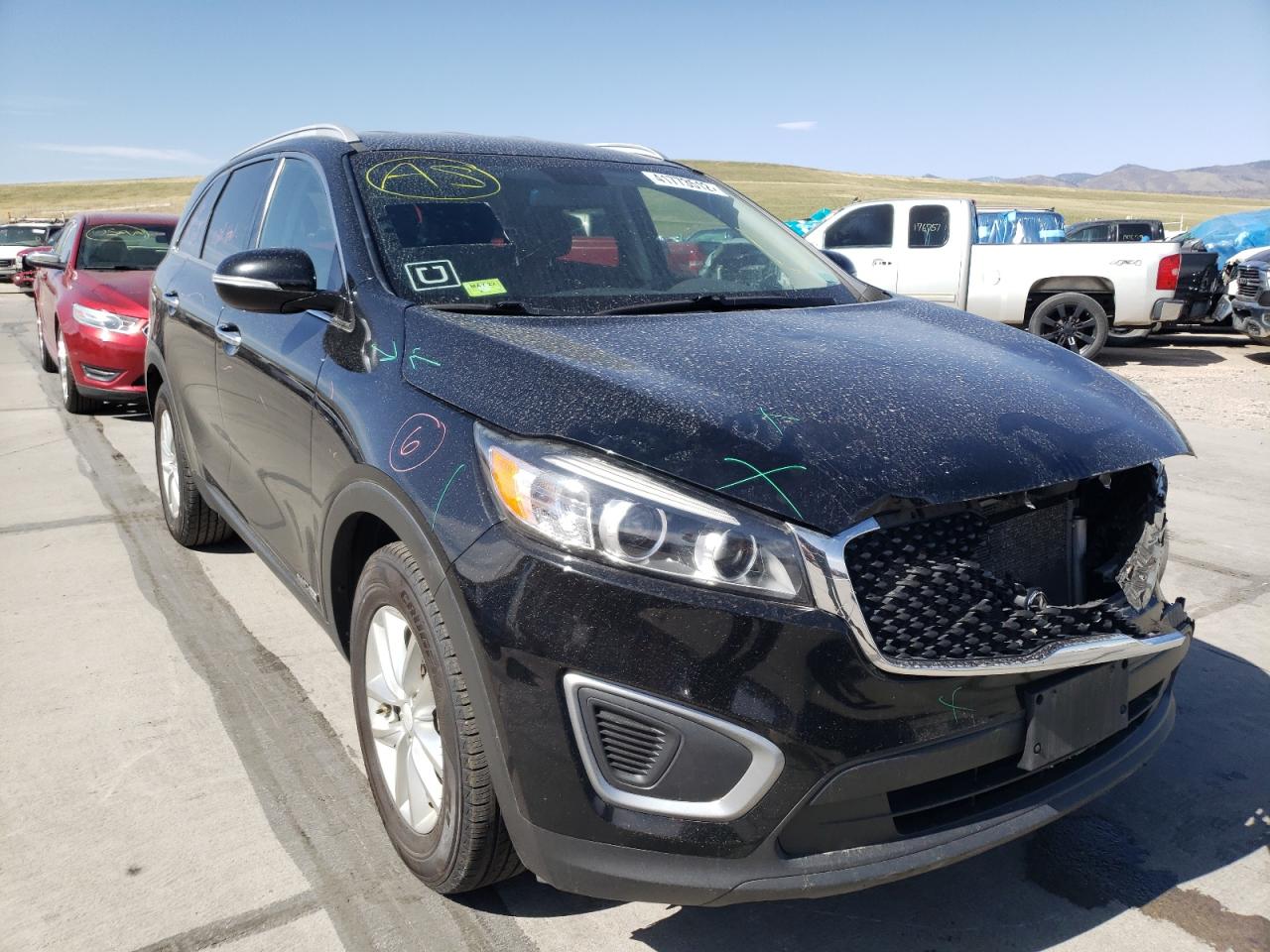 KIA SORENTO LX 2016 with VIN 5XYPGDA58GG180117 - Photo from auction