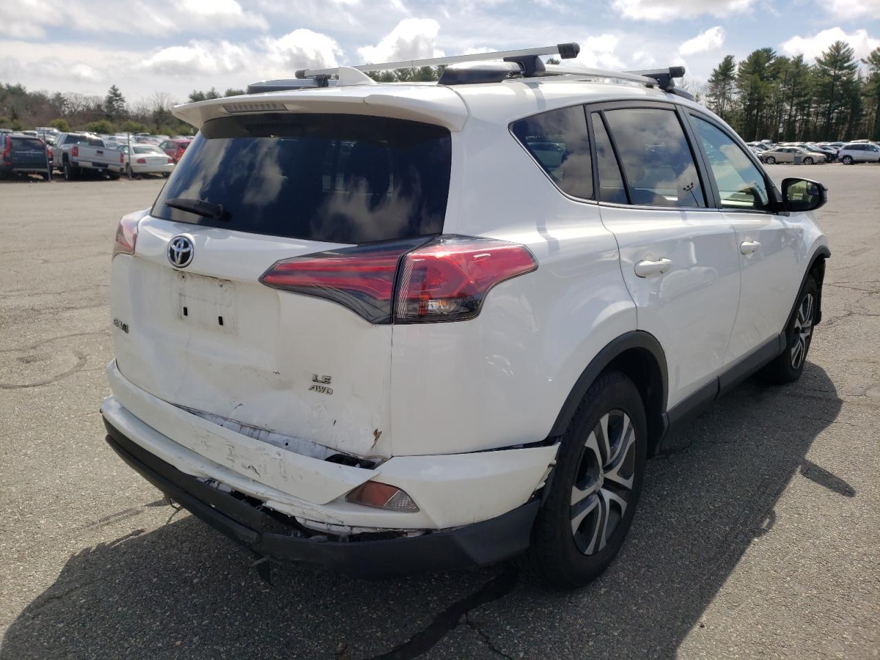 Photo 4 from auction – 2017 TOYOTA RAV4 LE with VIN JTMBFREV4HJ115092