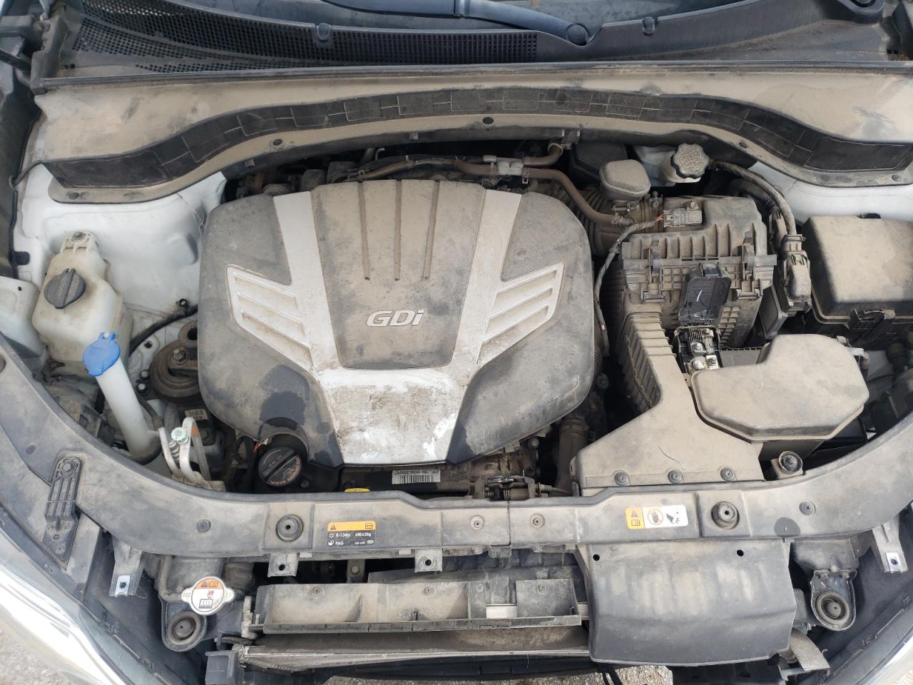 Photo 7 from auction – 2015 KIA SORENTO LX with VIN 5XYKTDA70FG604881