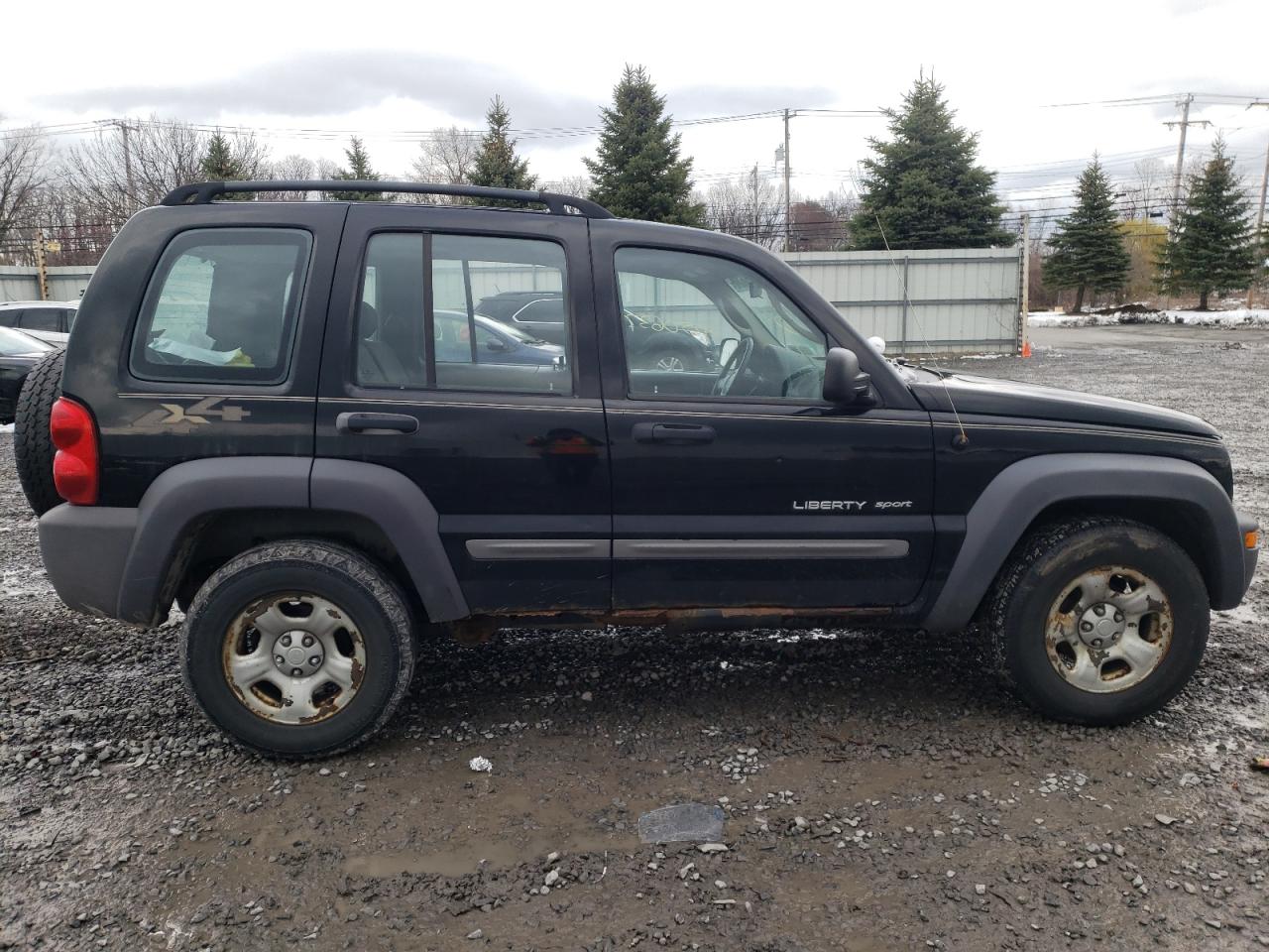 Photo 9 from auction – 2003 JEEP LIBERTY SP with VIN 1J4GL48K33W577040