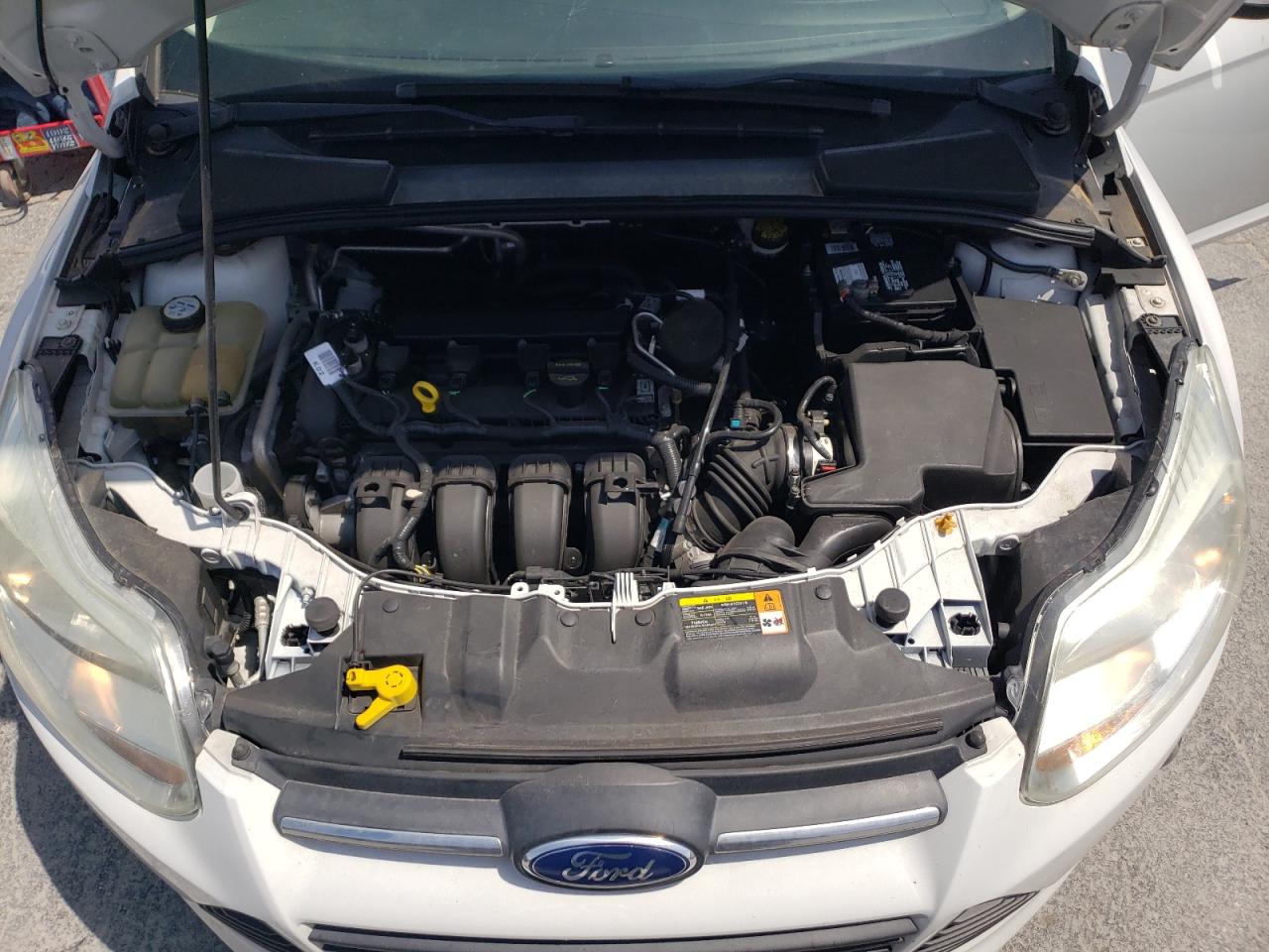 Photo 7 from auction – 2012 FORD FOCUS SE with VIN 1FAHP3F26CL142340
