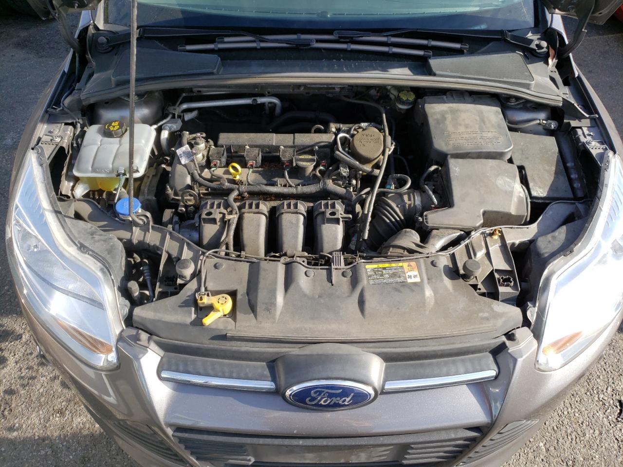 Zdjęcie 7 z aukcji – 2014 FORD FOCUS SE z VIN 1FADP3K27EL139129