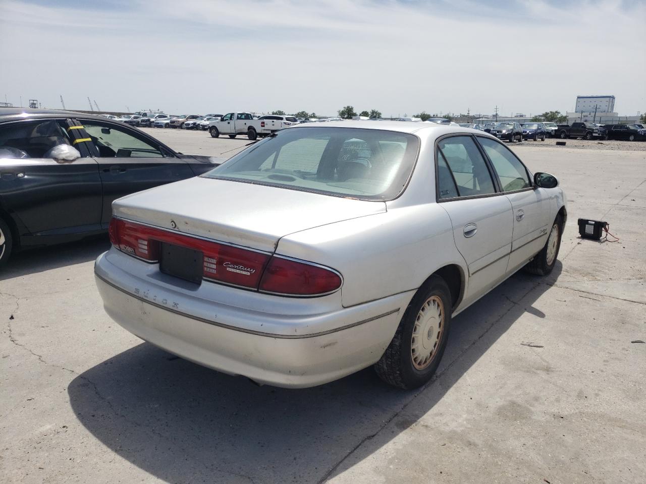 Foto 4 de la subasta – 2002 BUICK CENTURY con VIN 2G4WY55J421194245