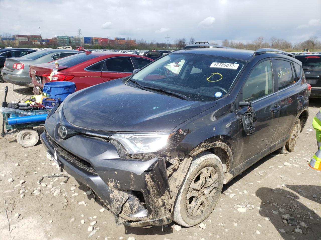 Photo 2 from auction – 2018 TOYOTA RAV4 LE with VIN JTMZFREV2JJ180740