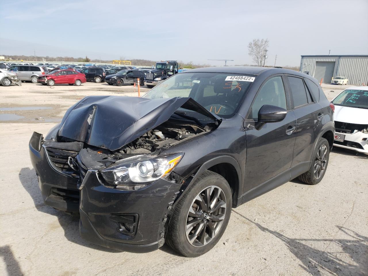Photo 2 from auction – 2016 MAZDA CX-5 GT with VIN JM3KE4DY0G0850178