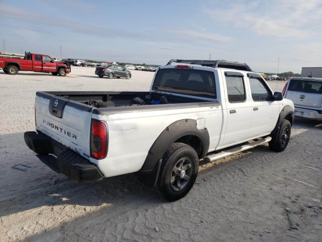 Photo 4 from auction – 2002 NISSAN FRONTIER C with VIN 1N6ED29X62C372947