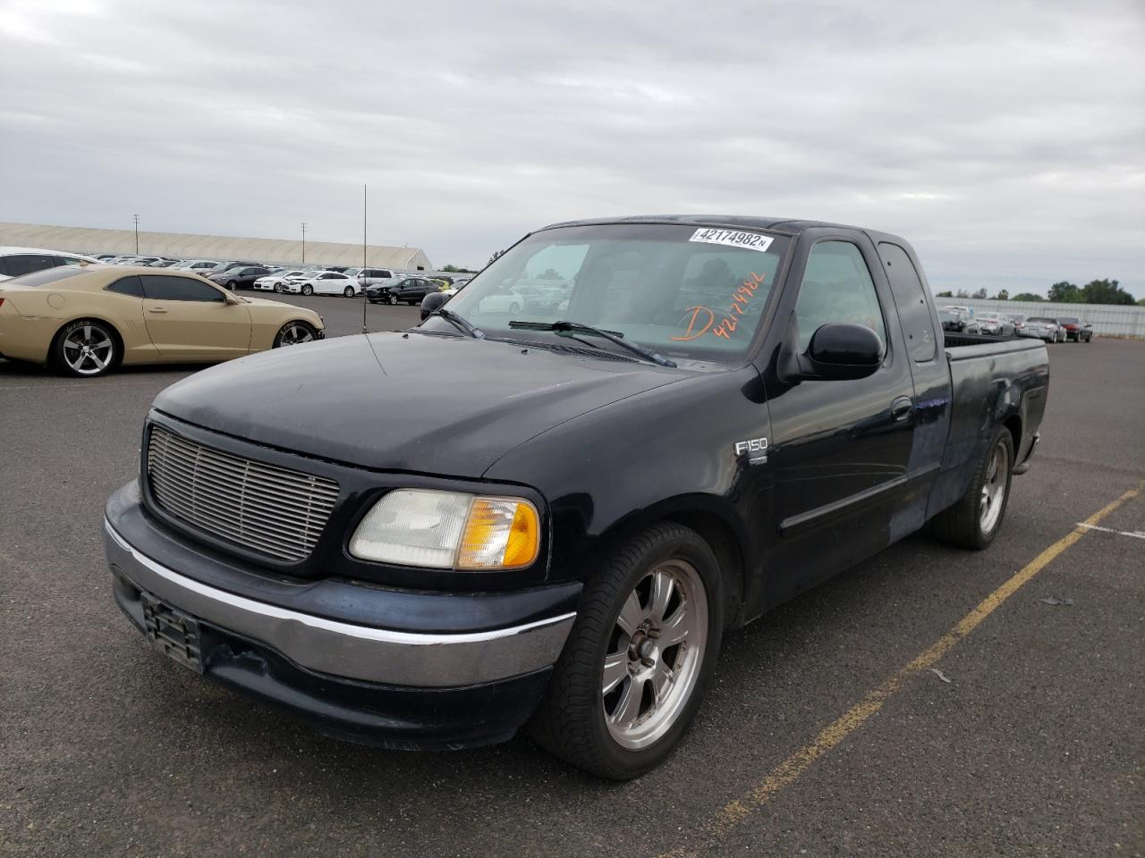 Photo 2 from auction – 2001 FORD F150 with VIN 1FTRX17LX1NB09305