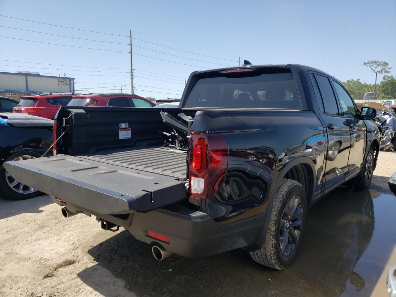 Photo 4 from auction – 2021 HONDA RIDGELINE with VIN 5FPYK3F13MB007103
