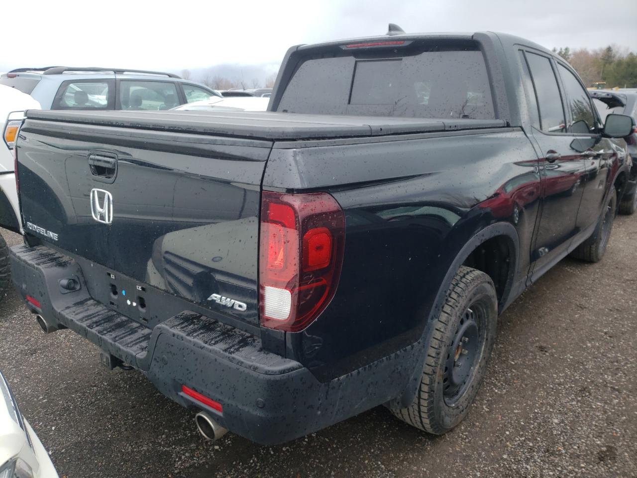Photo 4 from auction – 2022 HONDA RIDGELINE with VIN 5FPYK3F89NB501044