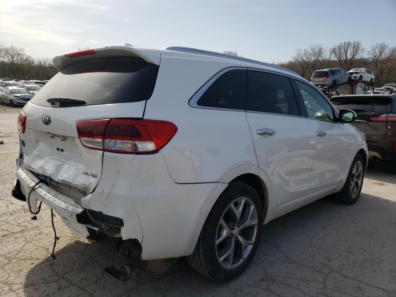Photo 4 from auction – 2016 KIA SORENTO SX with VIN 5XYPKDA19GG029914