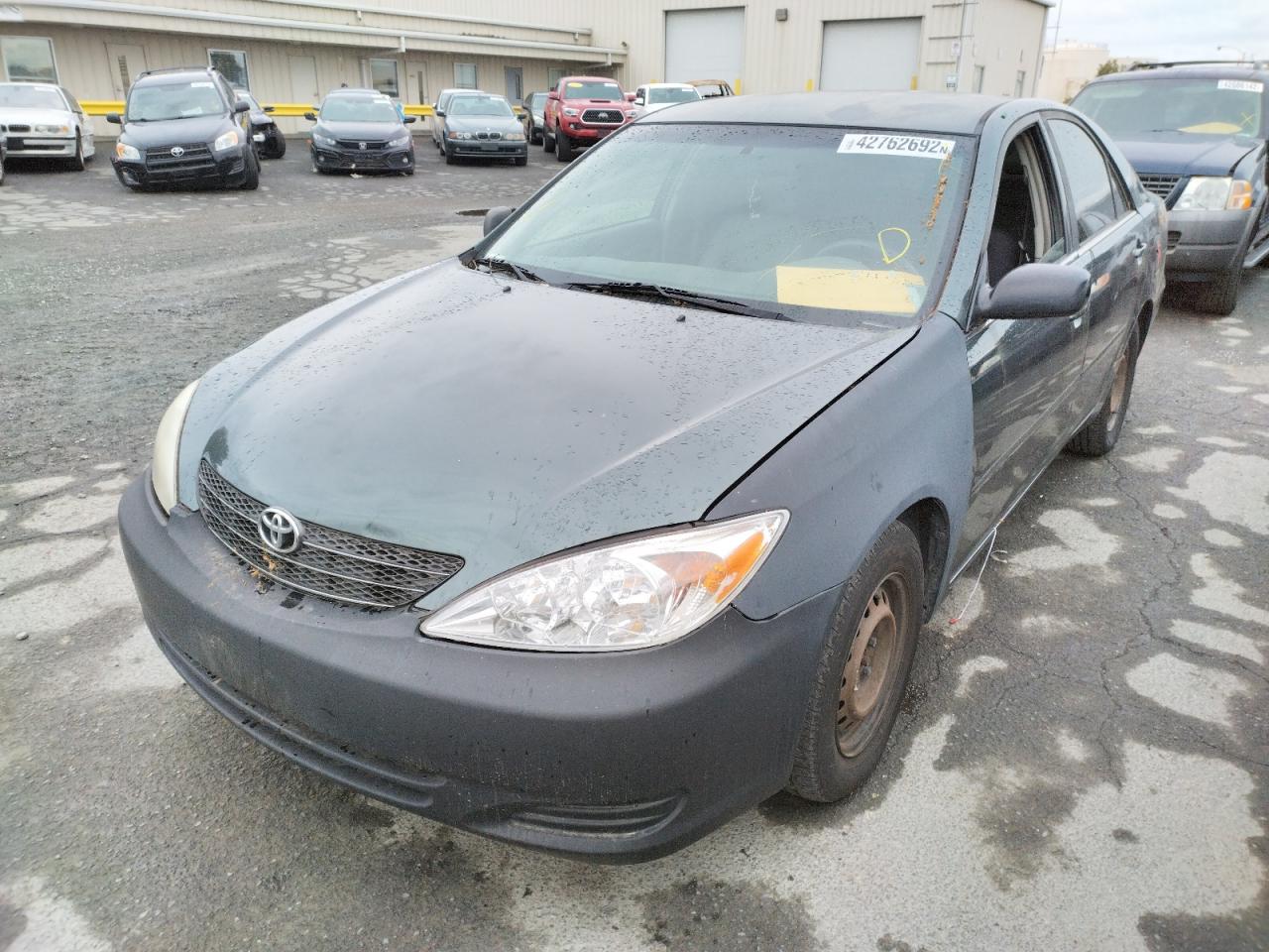 Photo 2 from auction – 2002 TOYOTA CAMRY LE with VIN JTDBE32K220024586