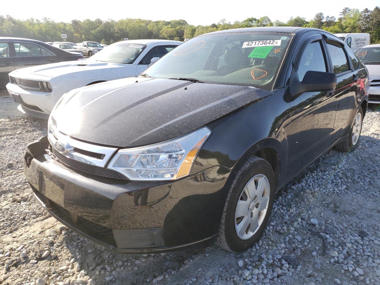 Photo 2 from auction – 2011 FORD FOCUS S with VIN 1FAHP3EN1BW124093
