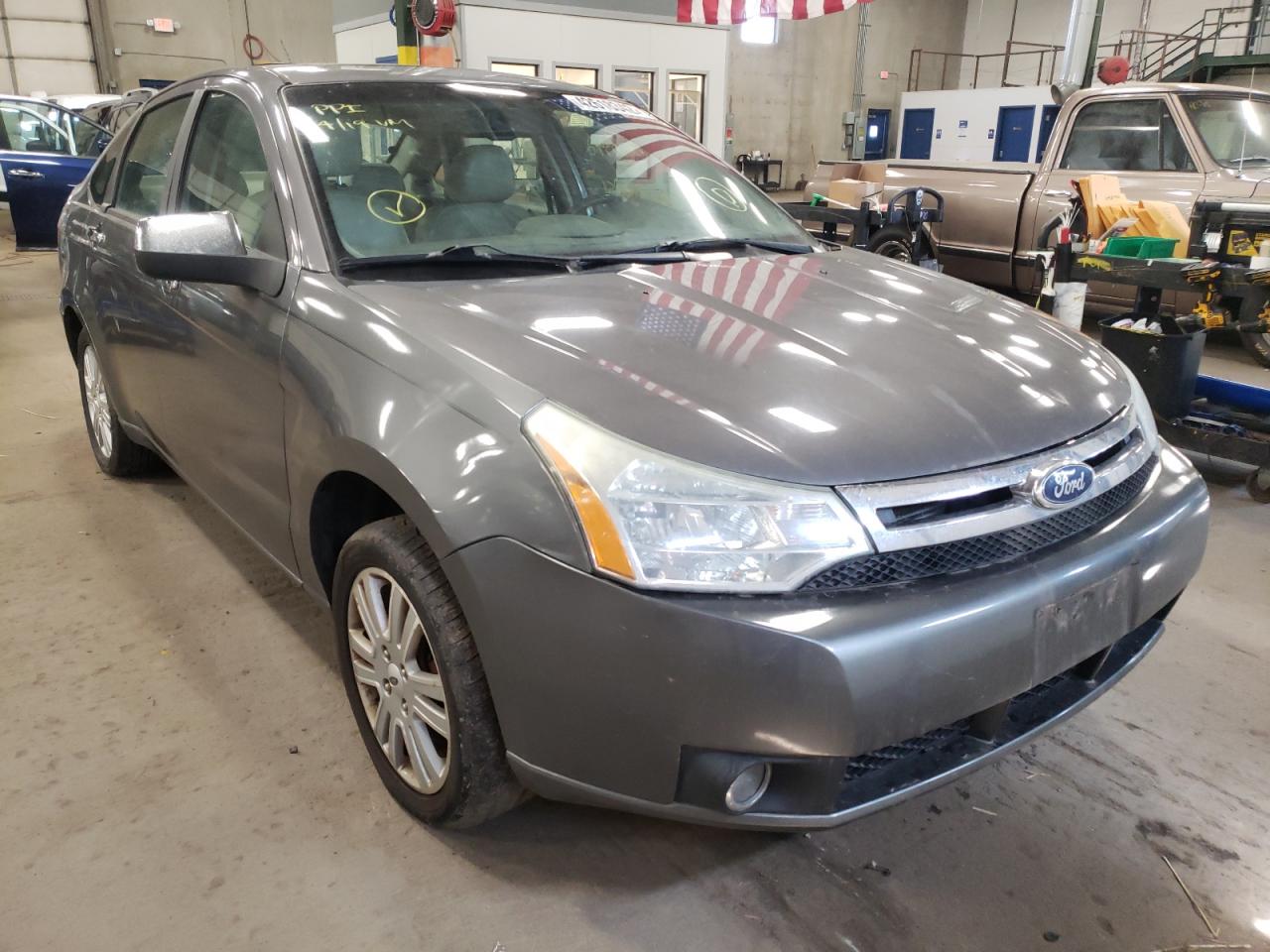 FORD FOCUS SEL 2011 with VIN 1FAHP3HN0BW149272 - Photo from auction