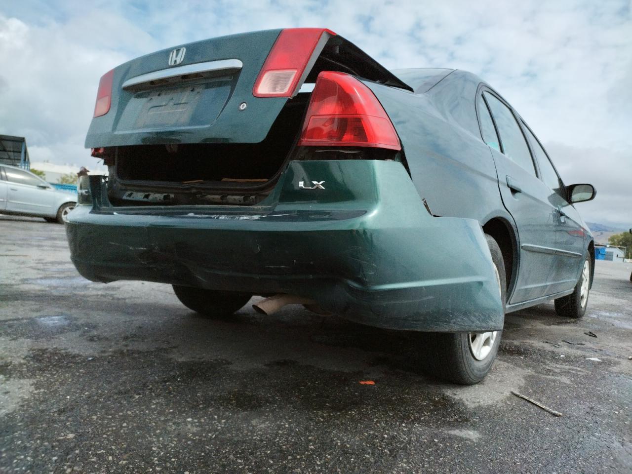 Photo 9 from auction – 2002 HONDA CIVIC LX with VIN 2HGES16632H579860