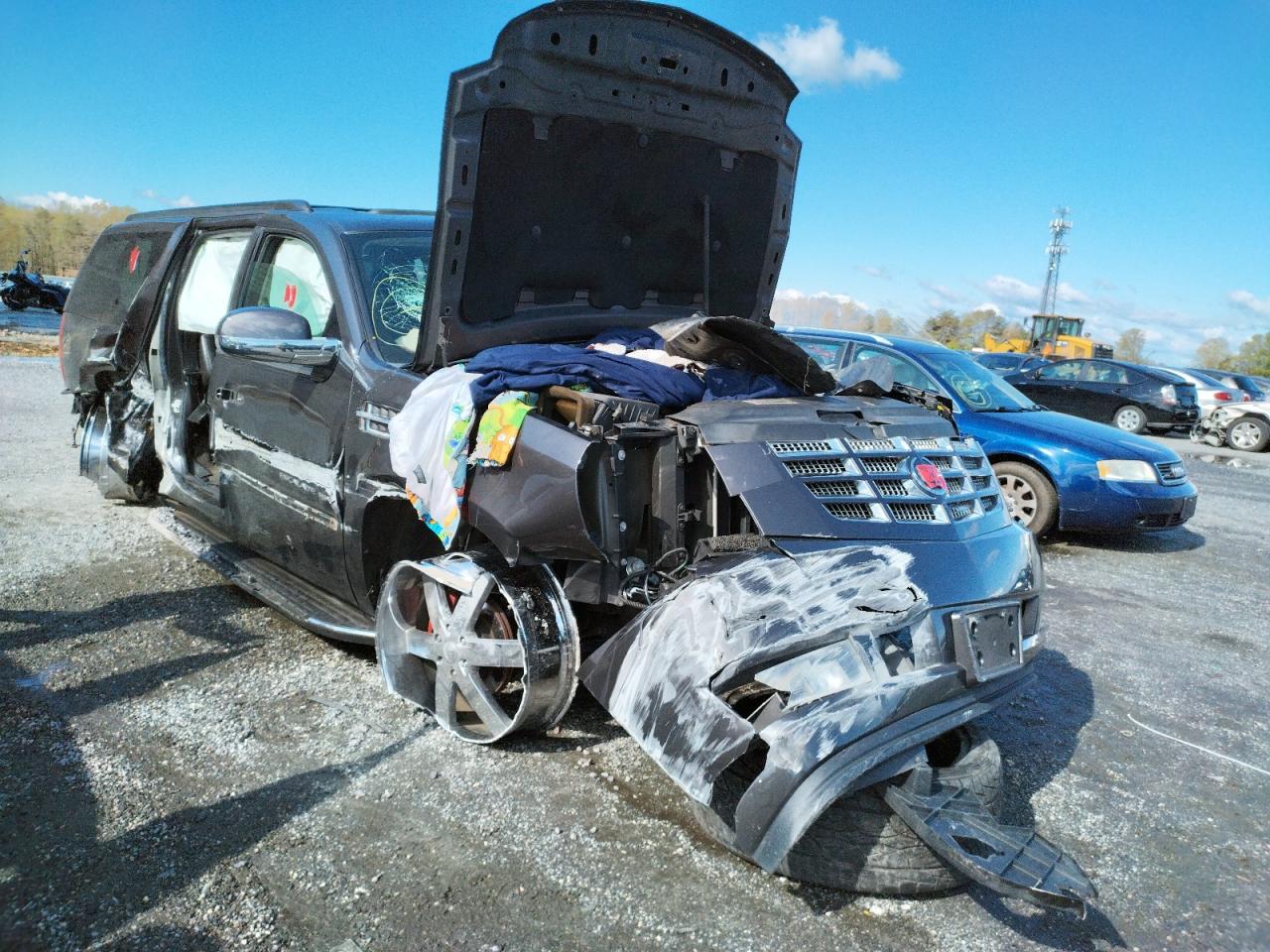CADILLAC ESCALADE E 2010 with VIN 1GYUKHEF4AR112525 - Photo from auction