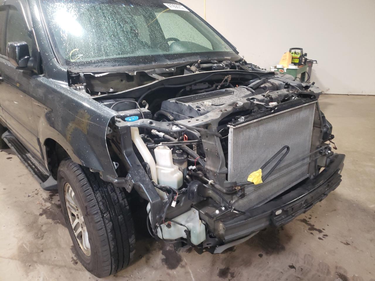 Photo 9 from auction – 2004 HONDA PILOT EX with VIN 5FNYF18494B006174