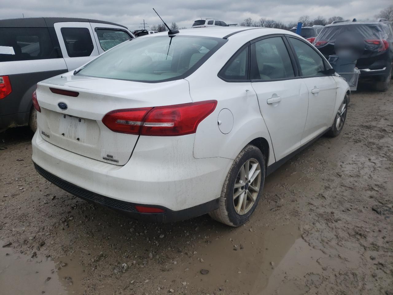 Photo 4 from auction – 2016 FORD FOCUS SE with VIN 1FADP3F21GL376387